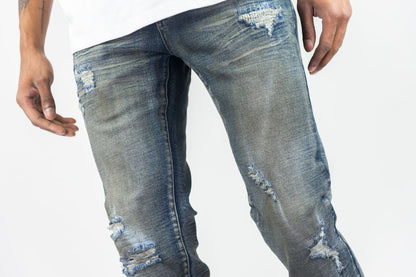 SLIM FIT DISTRESSED DENIM PANTS ROAD