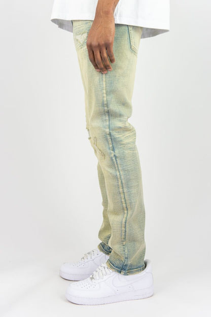 SLIM FIT DISTRESSED DENIM PANTS Road